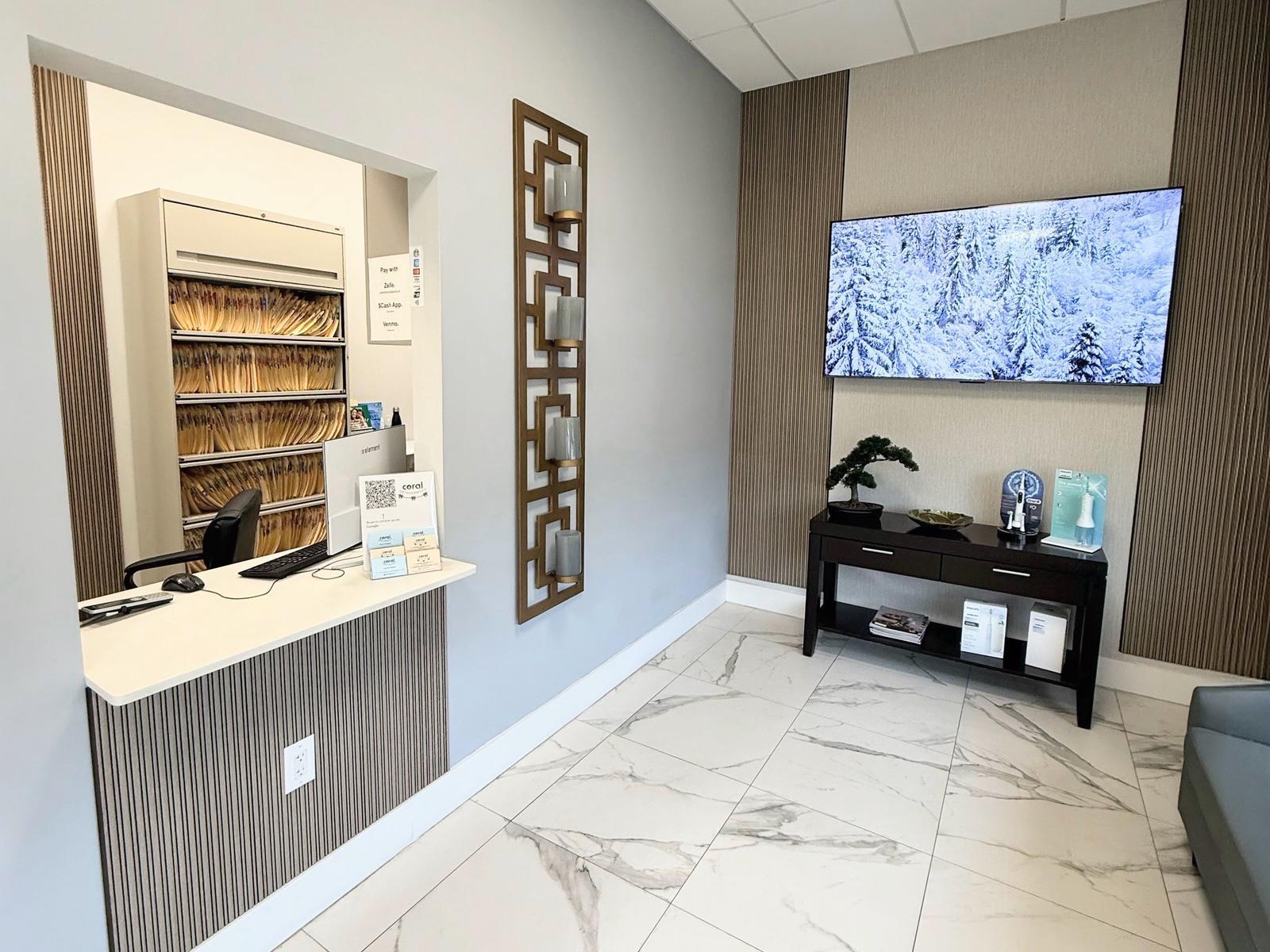 Coral Orthodontics reception desk and waiting room