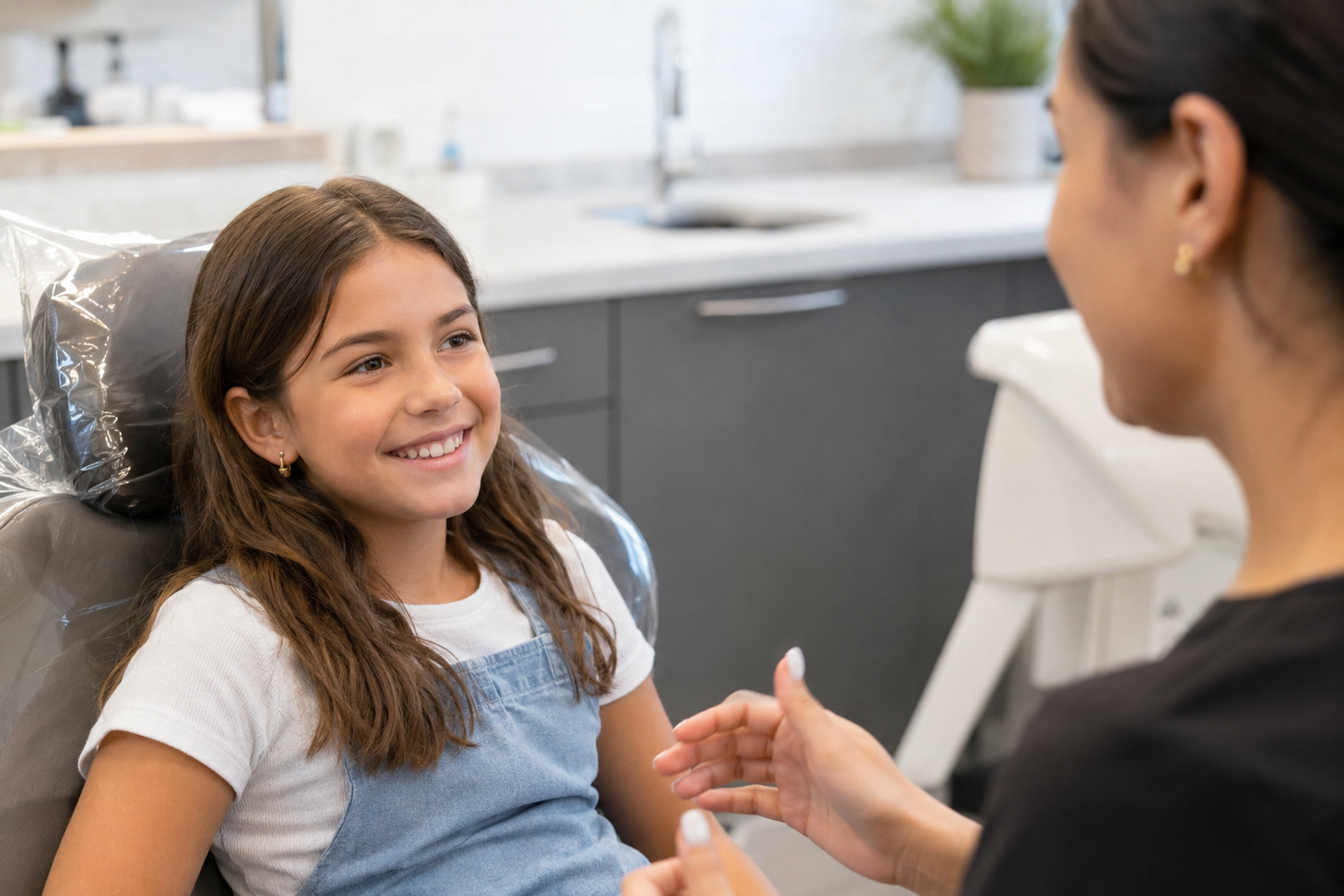 Smiling child patient in a friendly orthodontic office